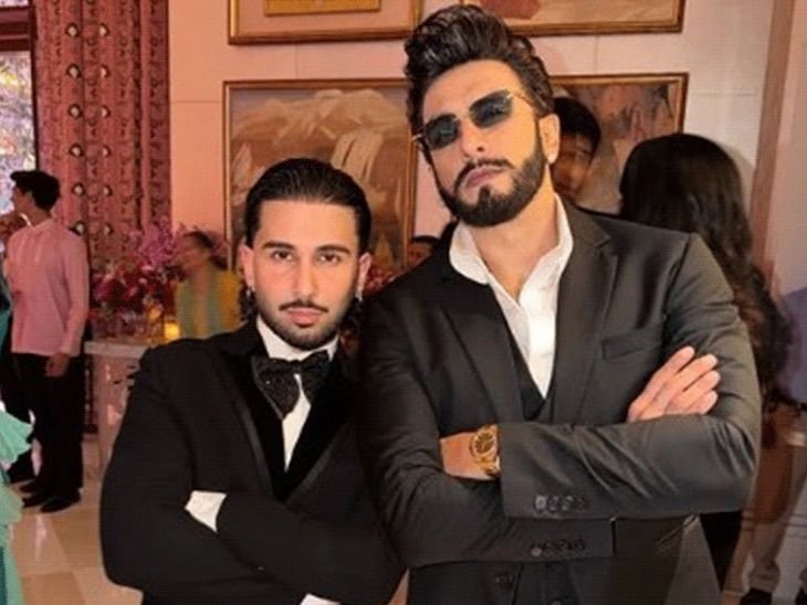 धमकी मिळाल्यानंतर रणवीर सिंगची पहिली सार्वजनिक उपस्थिती:ग्रँड वेडिंगमध्ये ओरीसोबत पोज देताना दिसला अभिनेता